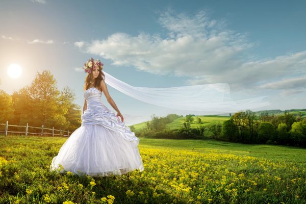 Beautiful bride in the outdoors - idyllic